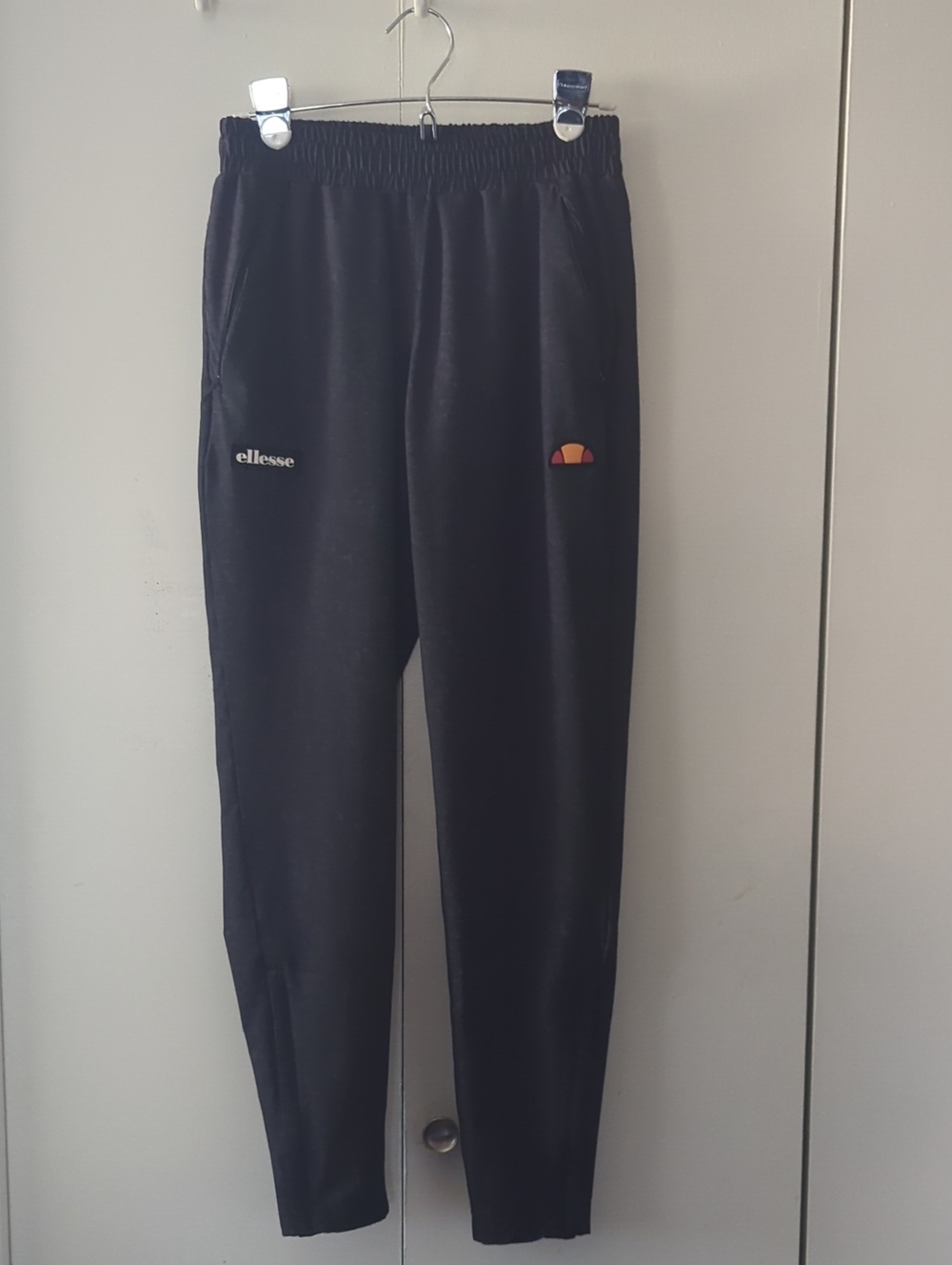 Ellesse Black Joggers with Small Orange Accent